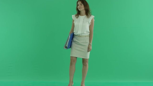 woman with file folder on green screen