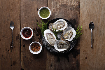 Oyster, Fresh sea Oyster set with side disc herb