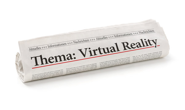 Zeitungsrolle mit der Überschrift Virtual Reality