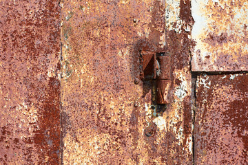 old rusty metal curtain on the garage