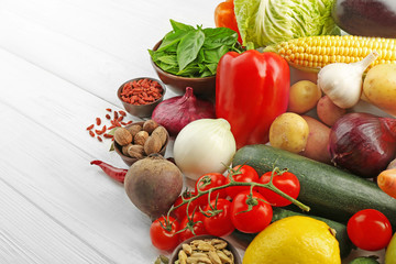 Vegetables and spices on wooden table