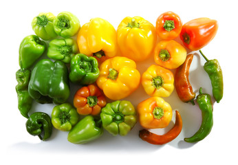 Fresh peppers on white background