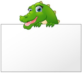 Obraz premium Cartoon Crocodile holding and looking over a blank sign board