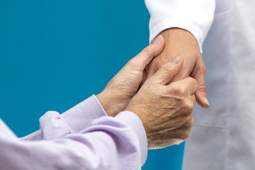 Women hand helping senior patient
