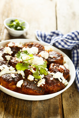 Meatballs in tomato sauce with feta cheese
