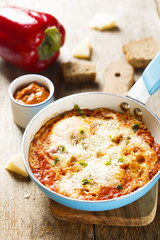 Omelette with cheese, bell pepper and tomatoes