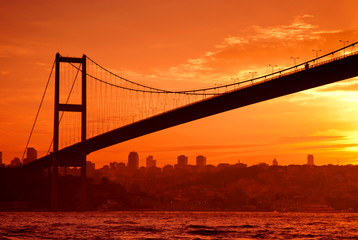 Bosphorus Bridge in Istanbul at sunset - obrazy, fototapety, plakaty