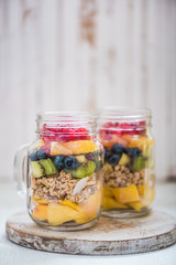 exotic fruits salad in mason jars