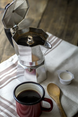 esspresso pot and red coffee cup