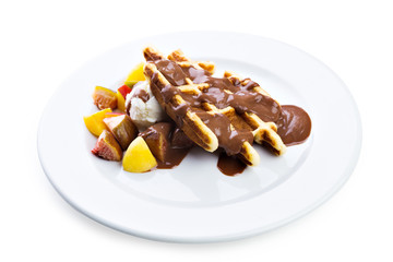 Belgium waffles with fresh berries and chocolate sauce