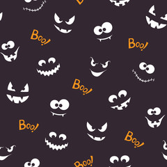 Seamless pattern with spooky and crazy faces in the dark and Boo! lettering for Halloween design