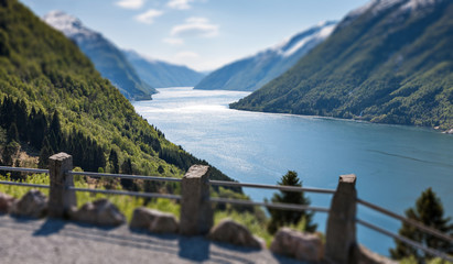 Obraz premium The tili-shift image of scenic landscapes with Norwegian fjords.