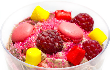 dessert in plastic cups cream with fruit and pastries and mousse