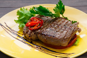 Restaurant food on wooden table. Perfect beef steak