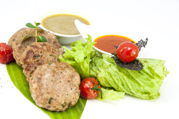 vegetarian meatballs with salad on a white background in restaurant