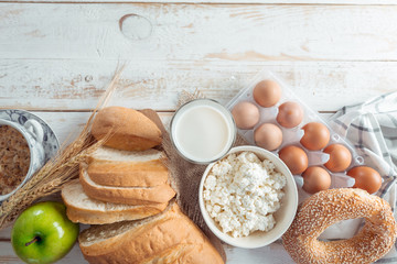 still life with dairy products, milk, eggs, bread