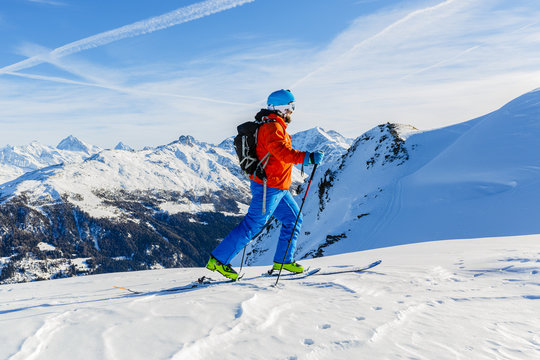 Ski touring in high mountains in fresh powder snow. Snow mountai