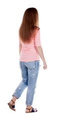 Obraz premium back view of walking woman . beautiful redhead girl in motion. backside view of person. Rear view people collection. Isolated over white background.