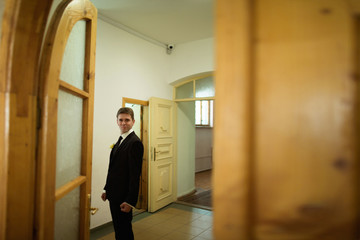 Fototapeta premium Groom in the hall