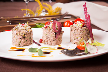 duck pate on white plate