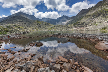 Clouds over Musala peak and reflection in Musalenski lakes,  Rila mountain, Bulgaria
