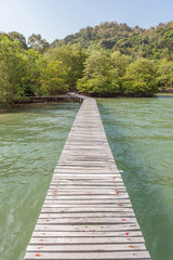 Wooden bridge on sea for tourist walking and relaxing.