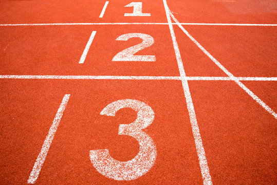 orange running track with number