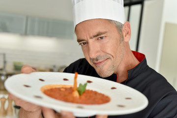 Restaurant chef presenting new dish