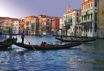 Obraz na płótnie Canvas gondolas on the Grand Canal in Venice at dusk