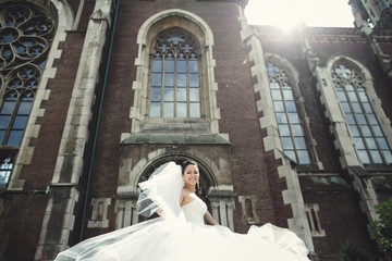 Obraz premium young bride standing at the old church