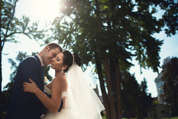 beautiful couple walking in the green park