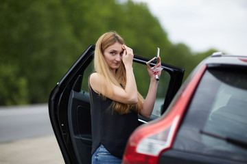 apply makeup girl near car