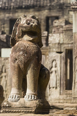Fototapeta na wymiar Sculpture of sitting lion at Bayon Temple