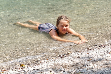 girl relaxing on the shore