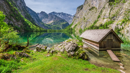 Fototapeta na wymiar Little hut at the Obersee lake in German Alps