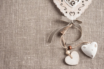 Linen background with xmas hearts