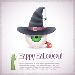 Happy Halloween card with a witch eye in hat.