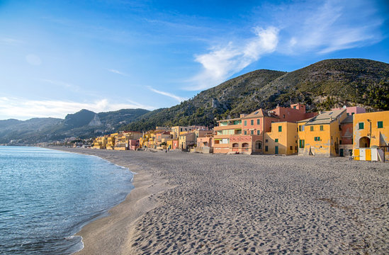 Colorful fisherman's houses on the sand beach lagoon on italian Riviera in Varigotti, Savona, Liguria, Italy