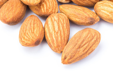 Close up of almonds on white