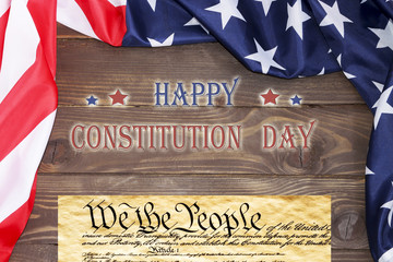 Fototapeta na wymiar Happy Constitution day, USA flag on wooden background .17 September in the USA, the Constitution Day.