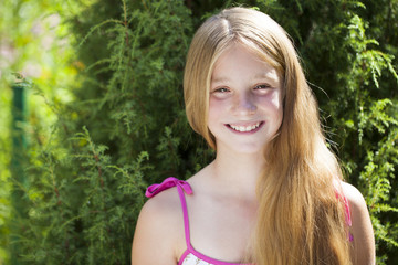 Portrait of a beautiful young blonde little girl