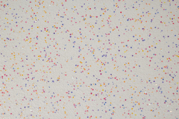 Multicolor fleck wall coating with glitter additions