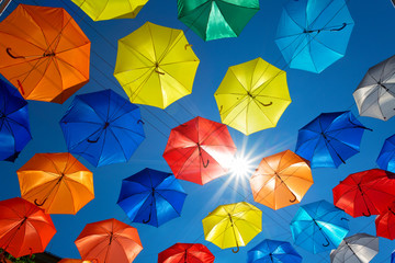 Street decorated with colored umbrellas