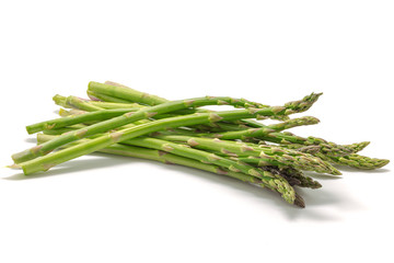 Fresh green asparagus on white