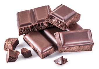 Pieces of chocolate bar isolated on a white background.