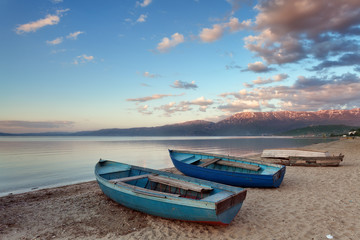 Wooden boats moored on the beach of Lake Ohrid, Pogradec, Albania