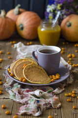 Pumpkin pancakes with sea buckthorn sauce for breakfast   