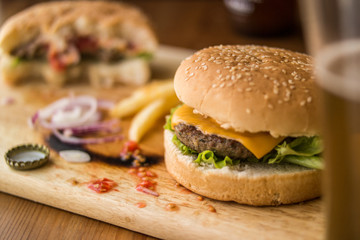 Homemade Hamburgers with Potatoes and Beverage.