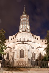 Fototapeta na wymiar Saint sernin basilica at night with a blue sky, Toulouse, France