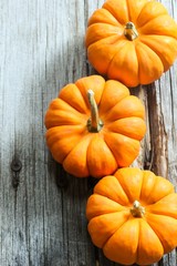 Autumn background with pumpkins with copy space, selective focus
